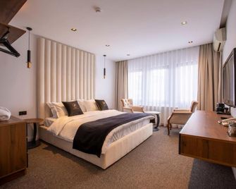 Plaza Boutique Hotel - Pristina - Schlafzimmer