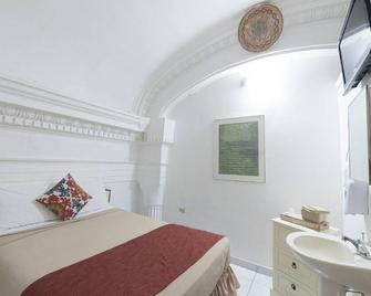 Hotel Colonial - Mayaguez - Slaapkamer