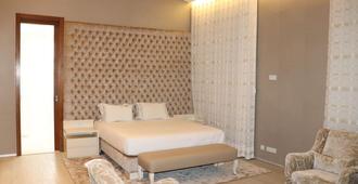 Afrin Prestige Hotel - Maputo - Bedroom
