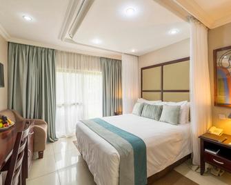 أزامبيزي ريفر لودج - شلالات فيكتوريا - غرفة نوم