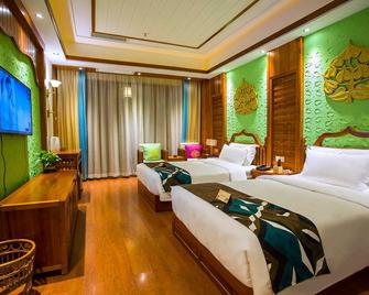 James Joyce Coffetel Xishuangbanna Gaozhuang Starlight Night Market - Xishuangbanna - Bedroom