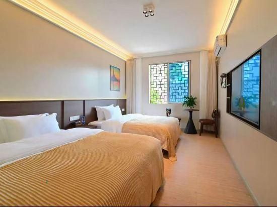 Good Friend Inn (Guilin Maternity and Child Bo'ai Hospital Baoxian Middle School Shop) - גילין - סלון