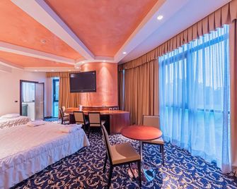 دادو هوتل إنترناشيونال - بارما - غرفة نوم