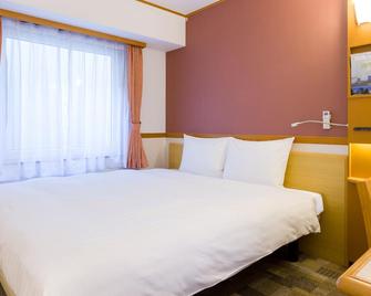 Toyoko Inn Tokyo Shinagawa-eki Takanawa-guchi - Tokio - Habitación