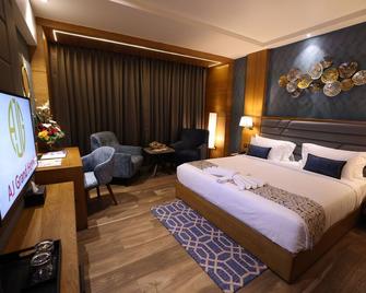 Aj Grand Hotel - Mangalore - Bedroom