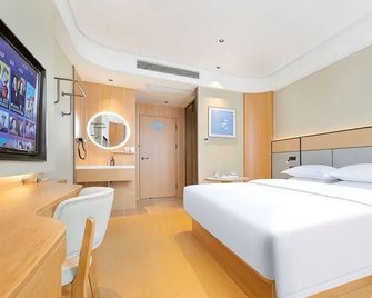 Qingxin Hotel - Enshi - Habitación