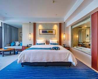 Nishi Haitai Junting Hotel - Weihai - Slaapkamer