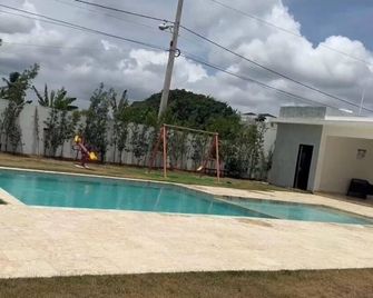 Cozy 2-bedroom apartment in pleasant Pontezuela with WiFi, AC - Tamboril - Pool