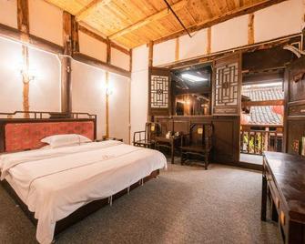 Caotang Inn - Bazhong - Bedroom