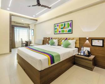 Treebo Sky City Grand, 5 Min From Mangalore Airport - Mangalore - Slaapkamer