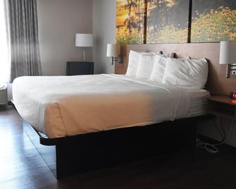 Days Inn by Wyndham Madisonville - Madisonville - Ložnice