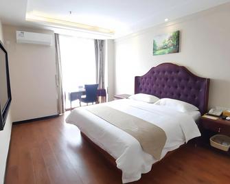Greentree Inn Jiangsu Taizhou Jingjiang Jiangping Road Shanghai City Business Hotel - Taizhou - Bedroom