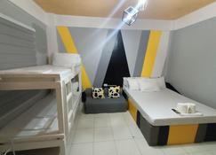 DJCI Apartelle with kitchen n bath 105-104 - Cabanatuan City - Bedroom
