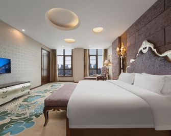 Qinzhu Hotel (Nanbin Road University of Business and Industry) - Tsjoengking - Slaapkamer