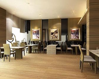 هوتل جراند إماوان - ماكاسار - مطعم