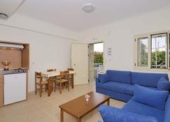 Manoleas Villas- Apartment 1 - Stoupa - Wohnzimmer