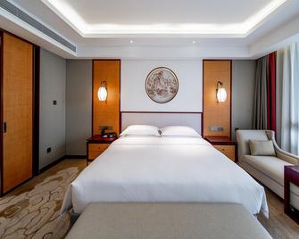 Wuqiao Yun Zen Jinling Acrobatic Hotel - Dezhou - Спальня