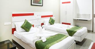 Treebo Trend Bagga International - Aurangabad - Phòng ngủ