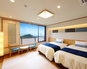 Washu Blue Resort Kasago - Kurashiki - Schlafzimmer