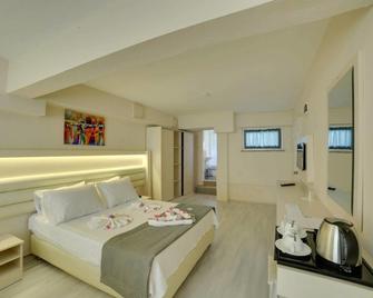 Carpe Mare Beach Resort - Akbük - Camera da letto