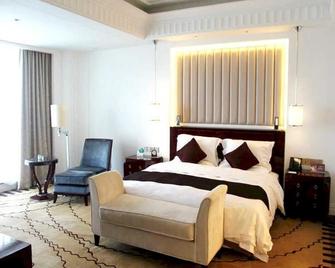 Fengguan Holiday Hotel - Dezhou - Bedroom