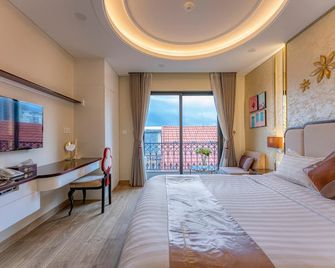 Golden Tree Hotel & Apartment - Ciudad Ho Chi Minh - Habitación