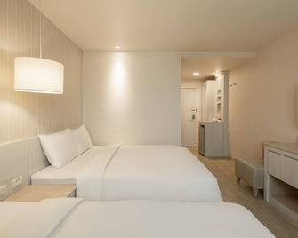Kindness Hotel Houyi Jiuru - Kaohsiung City - Bedroom