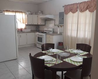Charming family home in a serene gated community of The Crossings - Arima