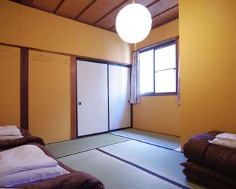 Hida Takayama Guest House tau - Hostel - Takayama - Κρεβατοκάμαρα