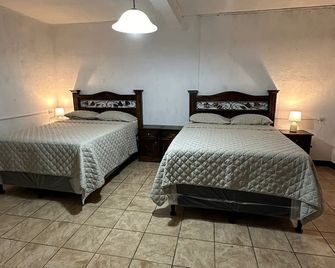 نيزان هوتل - أنتيغوا غواتيمالا - غرفة نوم