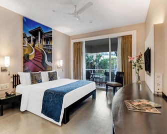 Whispering Palms Beach Resort - Candolim