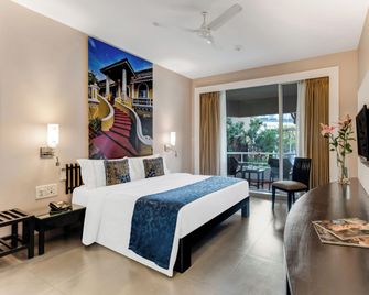 Whispering Palms Beach Resort - Candolim