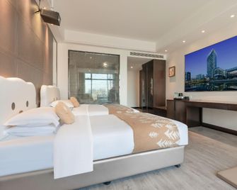 Btg-Nanyuan Galaxy Hotels - Ningbo - Bedroom