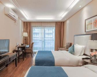 Sweetome Vacation Apartment (Jiefangbei Xiexin Mansion) - Chongqing - Bedroom