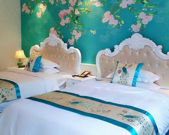 Jun Yi Hotel - Zhangzhou - Slaapkamer