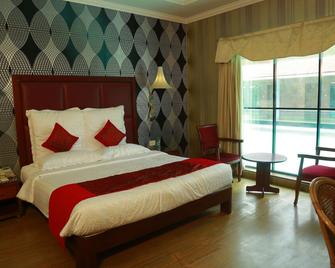 Saj Earth Resort & Convention Center , Kochi - Nedumbassery - Bedroom