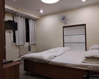 Dwivedi Hotels Palace On Steps - Varanasi - Yatak Odası