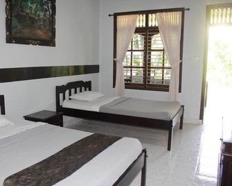 Mangga Bali Inn - Kuta - Bedroom
