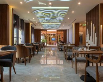 Dancenter Emerald Near Jeddah Corniche - Jedda - Restaurante