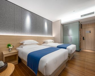 وينشين هوتل واشي - غوانغزهو - غرفة نوم