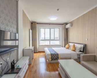 Donghaicheng Holiday Apartment - Yantai - Κρεβατοκάμαρα