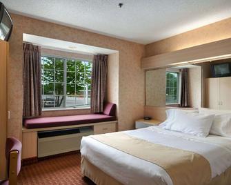 Microtel Inn & Suites by Wyndham Baldwinsville/Syracuse - Baldwinsville - Bedroom