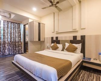 Hotel O Rana Residency Near Western Express Highway Metro Station - Mumbai - Bedroom