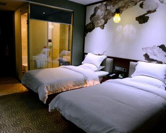 Xinghe Yuezhi · S Hotel Guangzhou Yuexiu Railway Station - גואנגג'ואו - חדר שינה