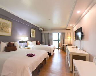 Days Inn by Wyndham Guam Tamuning - טאמונינג - חדר שינה