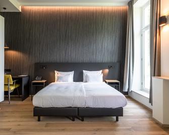 Hotel Kronacker - Tienen - Спальня