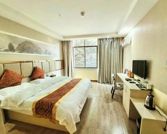 Zhejiang Business Hotel - Qianxinan - Bedroom