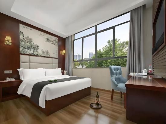 Wansheng Business Hotel - تشانغشا - غرفة نوم