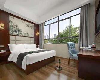 Wansheng Business Hotel - Changsha - Soverom