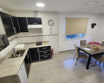 Comarca Sur Apartamentos - Ushuaia - Køkken